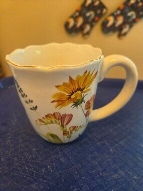 flowered mug with flowers around the mug by market square